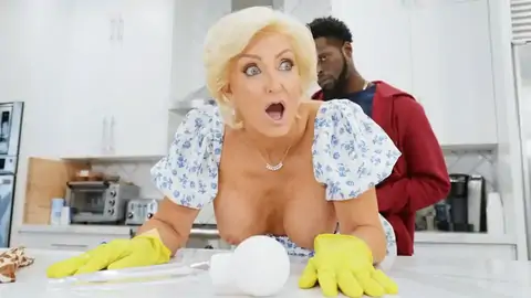 Light-Haired GILF is banged in the standing doggy style